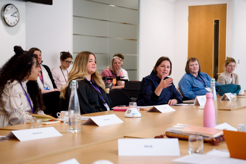 Dame Nicole Jacobs hosts a roundtable with survivors and ministers to discuss support services and recovery.
